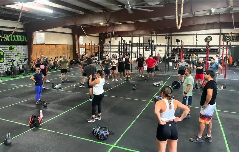 A packed Toxic Fitness class working out on the gym floor